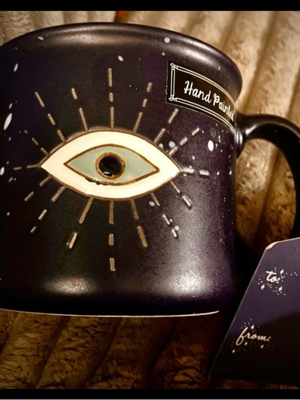 Hand-Painted Black Ceramic Coffee Mug with Gold & Cream Eye Accent